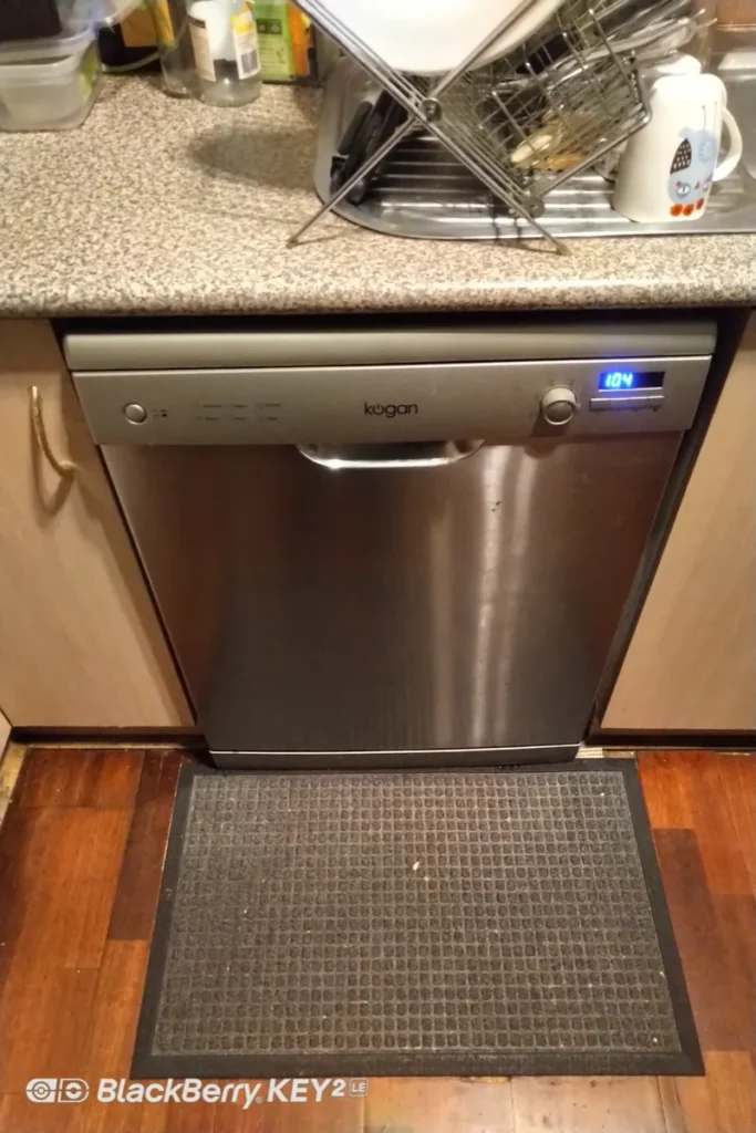 Kogan dishwasher with the control panel lit up in a client’s home.
